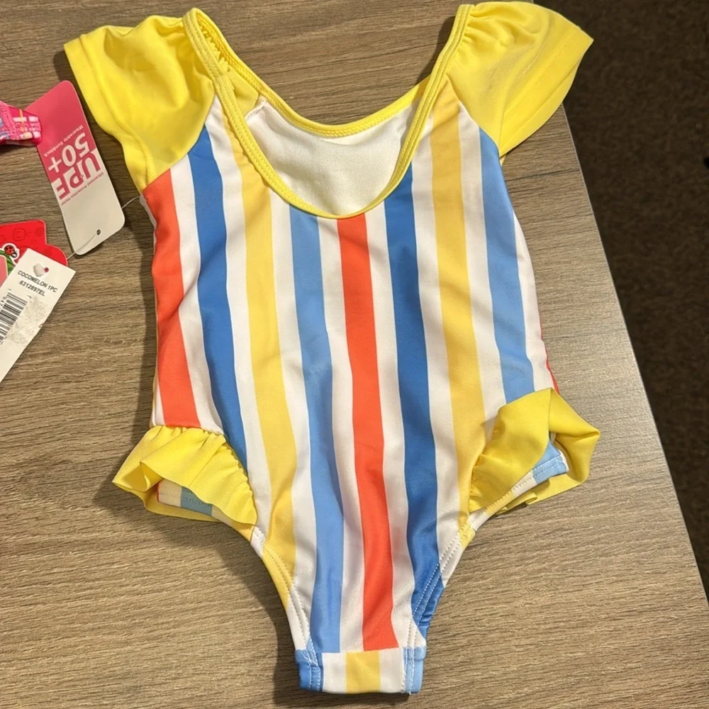 3 item bundle 2 items NWT 2 swimsuits and a girls dress 12m pink swimsuit 12-18m